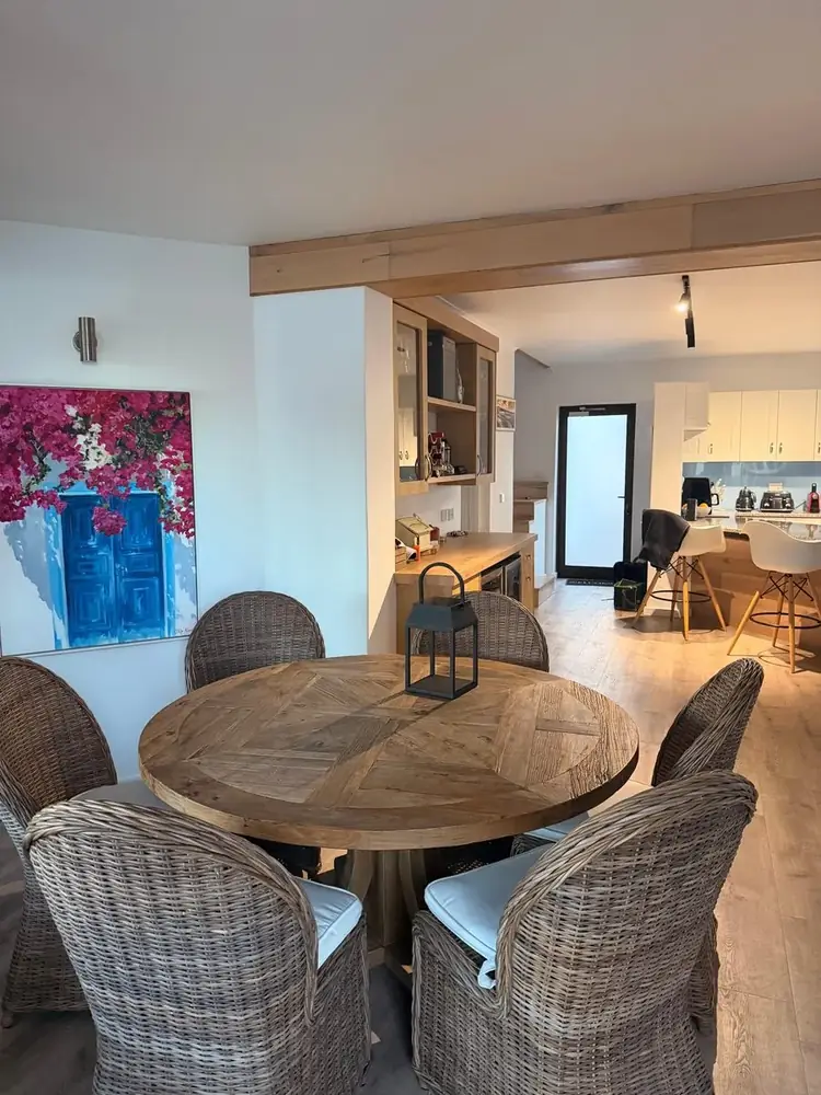 Dining room with bougainvillea artwork