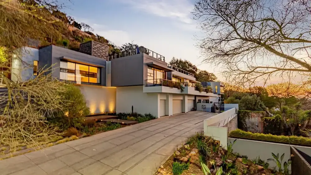 Hillside contemporary home at sunset