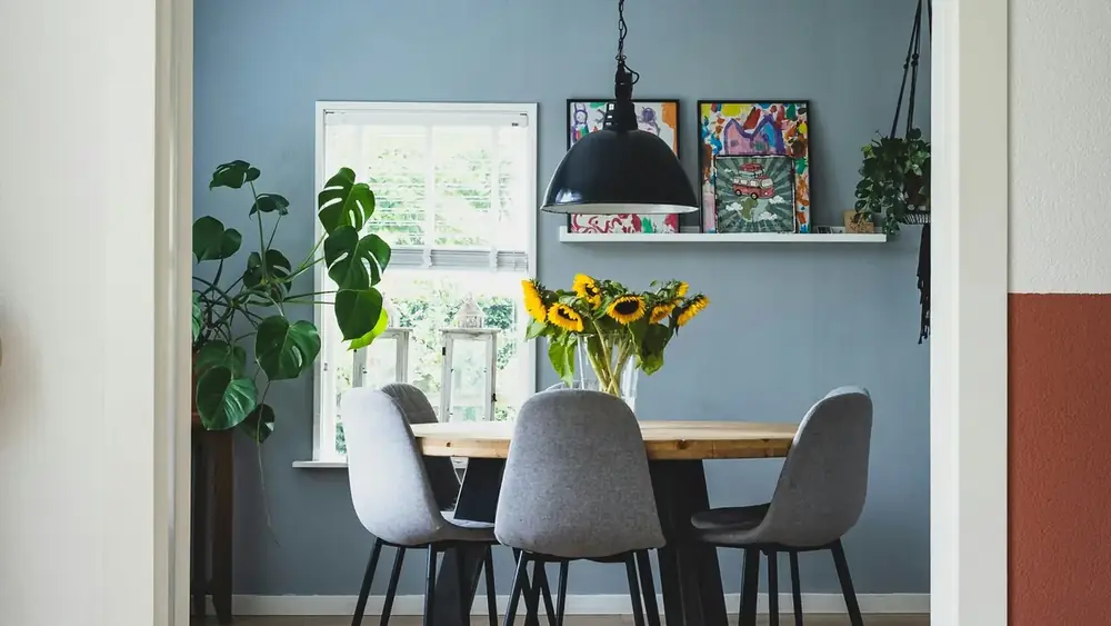 Cozy home dining room with plants and natural light
